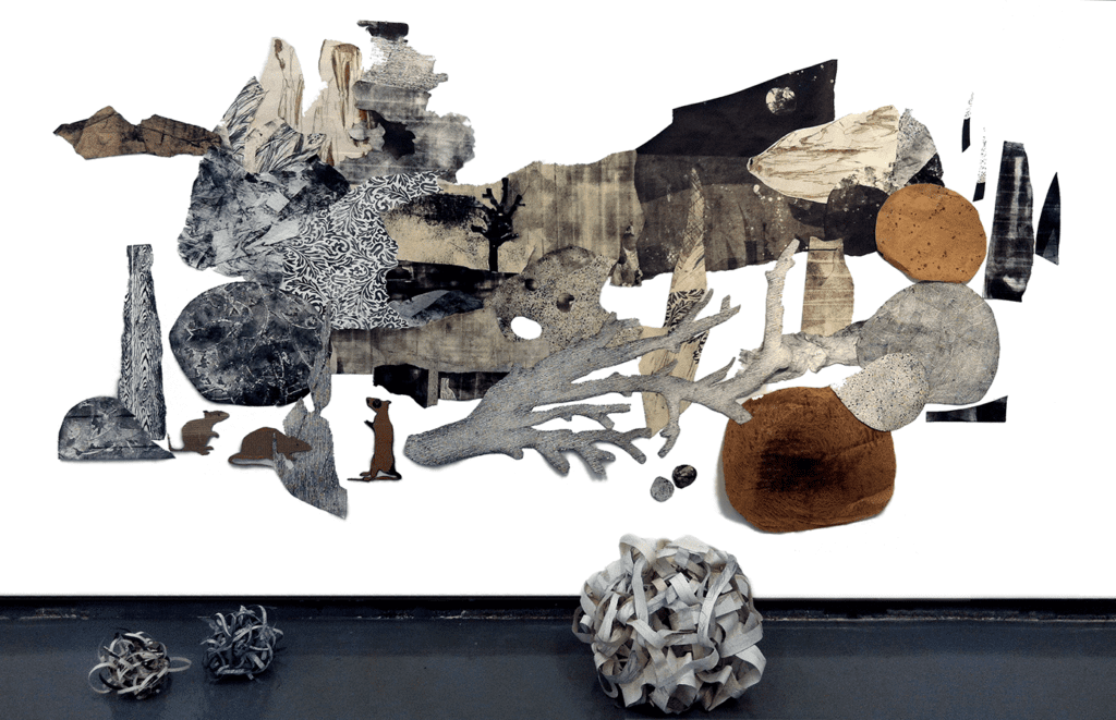 Earthquake: collage of paper rocks, trees and sky